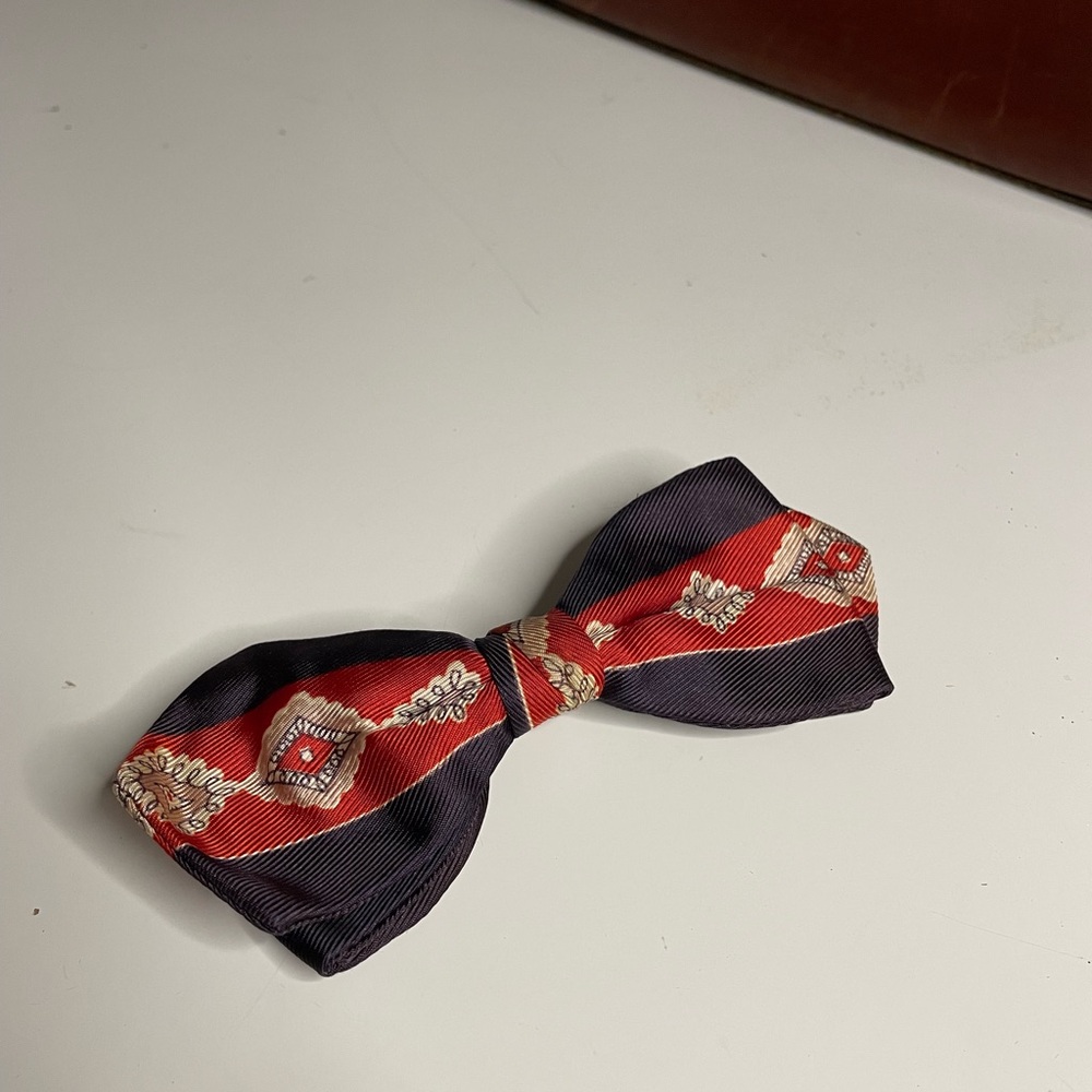 Elegant red and navy bow tie